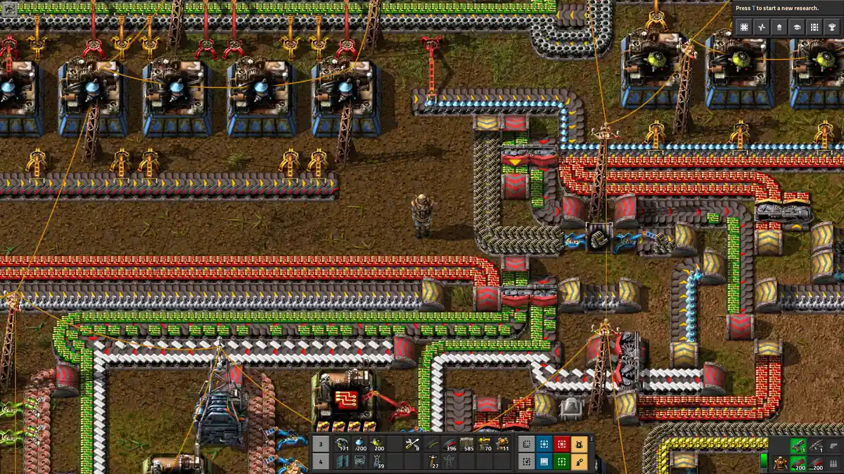 Official Factorio screenshot with multiple belt branches feeding compact production lines
