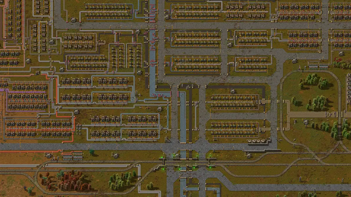 Official Factorio screenshot showing a broad belt layout with organized production branches